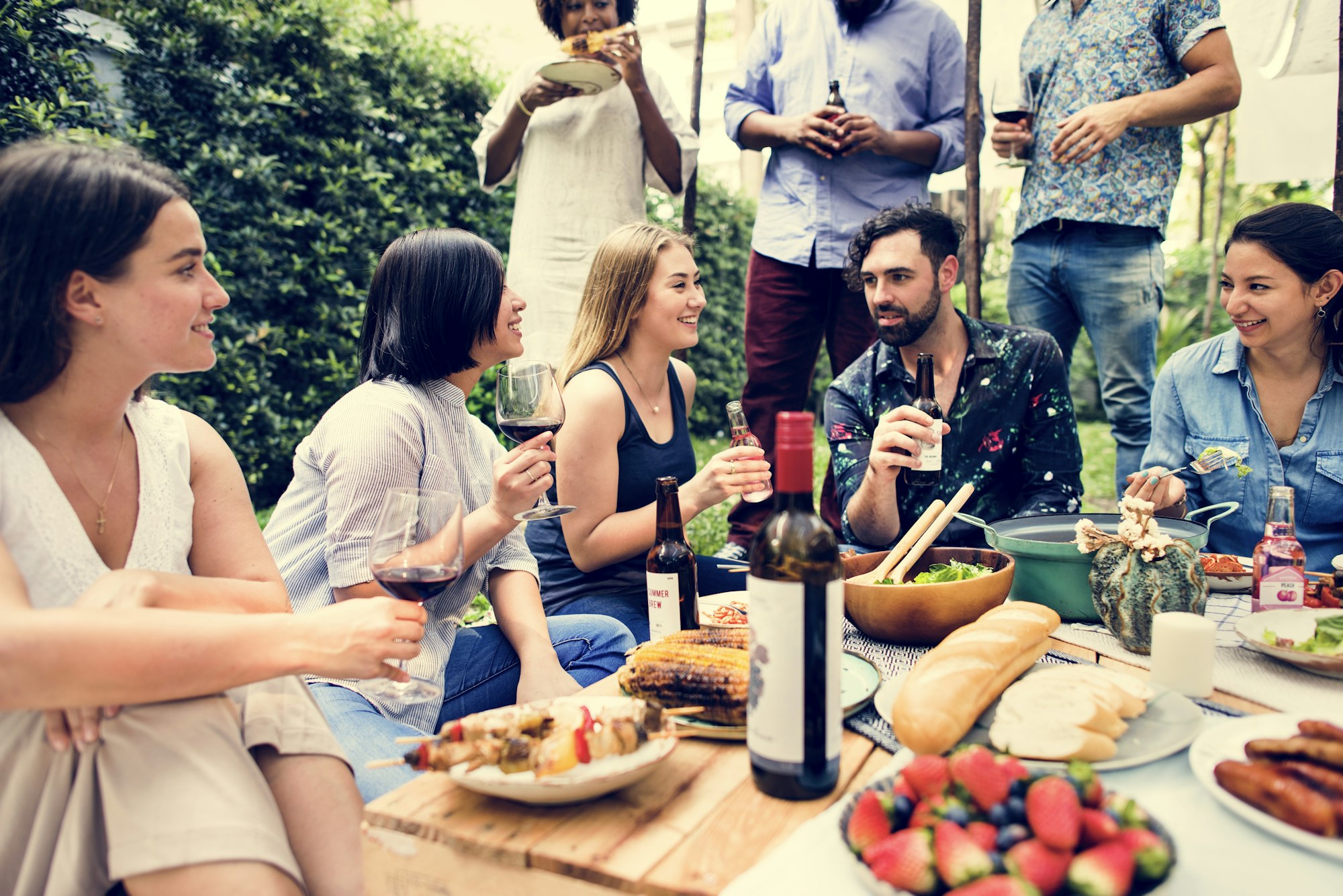 Summer party of friends in the garden